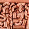 Copper elbow,Tee way copper pipe, industrial background Copper-pipes-for-sale-in-nairobi-2