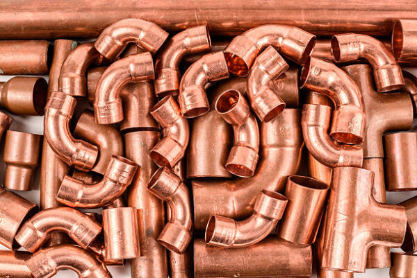Copper elbow,Tee way copper pipe, industrial background Copper-pipes-for-sale-in-nairobi-2